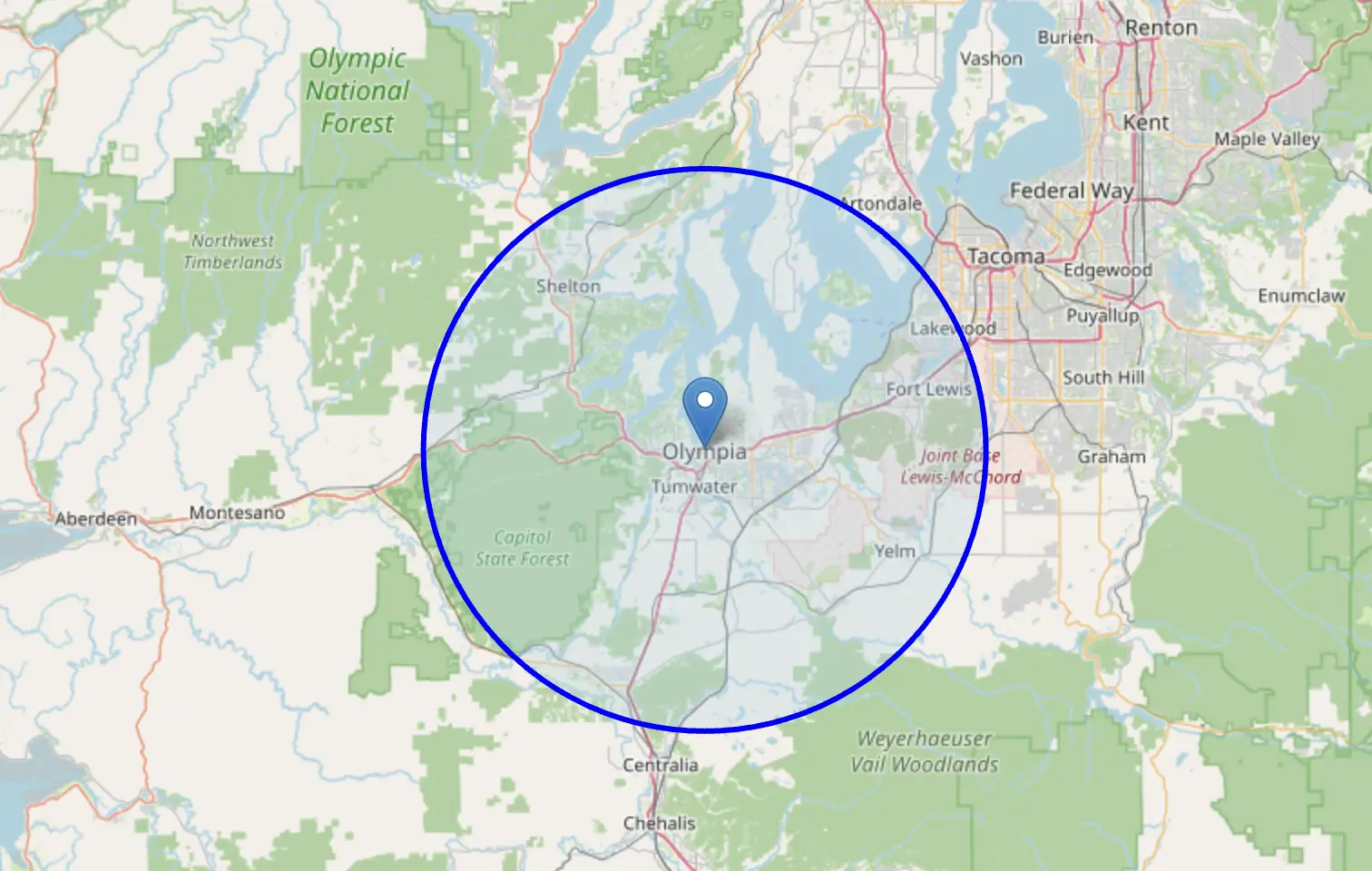 Map of the Olympia area with a blue circle marking the service radius, covering Lacey, Tumwater, Yelm, Tenino, and Rochester